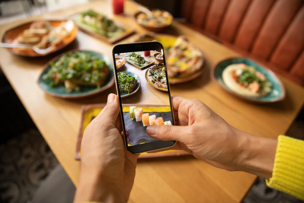 close-up-hands-holding-smartphone 1 - Marketing Platter video marketing